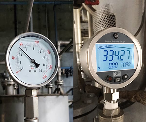 Analog Bourdon tube gauge and digital pressure gauge installed in industrial applications