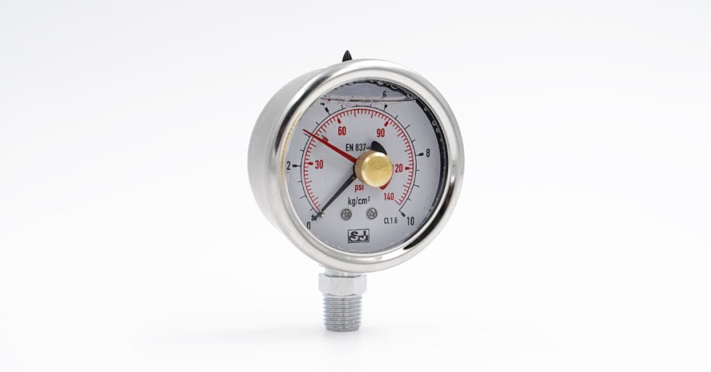 Liquid filled with drag pointer to track peak system pressure