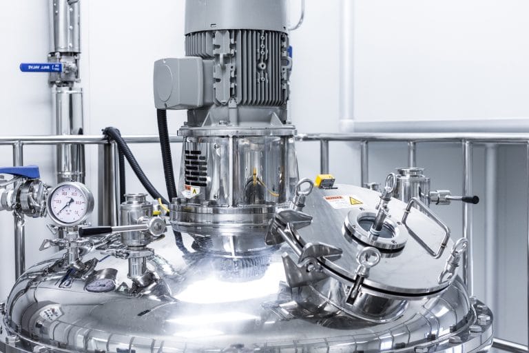 Stainless steel industrial machinery in a clean production facility