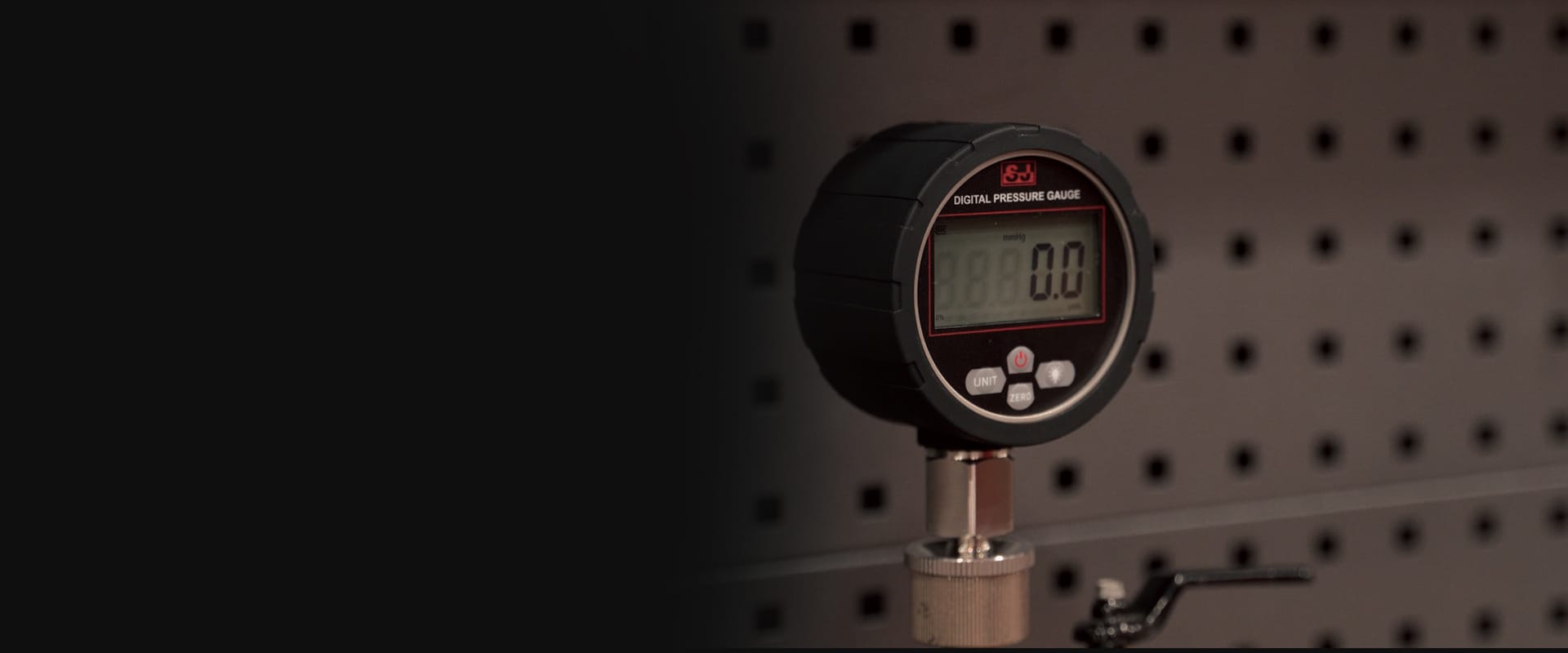 Digital industrial pressure gauge on a test bench